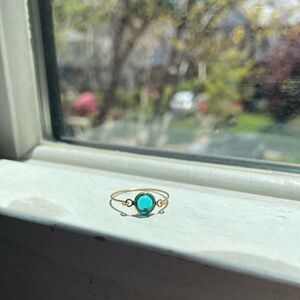 Beautiful gold ring with blue gem
